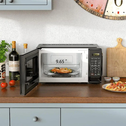Mainstays 700W Compact Countertop Microwave with Child Safety Lock - 0.7 Cu. Ft.